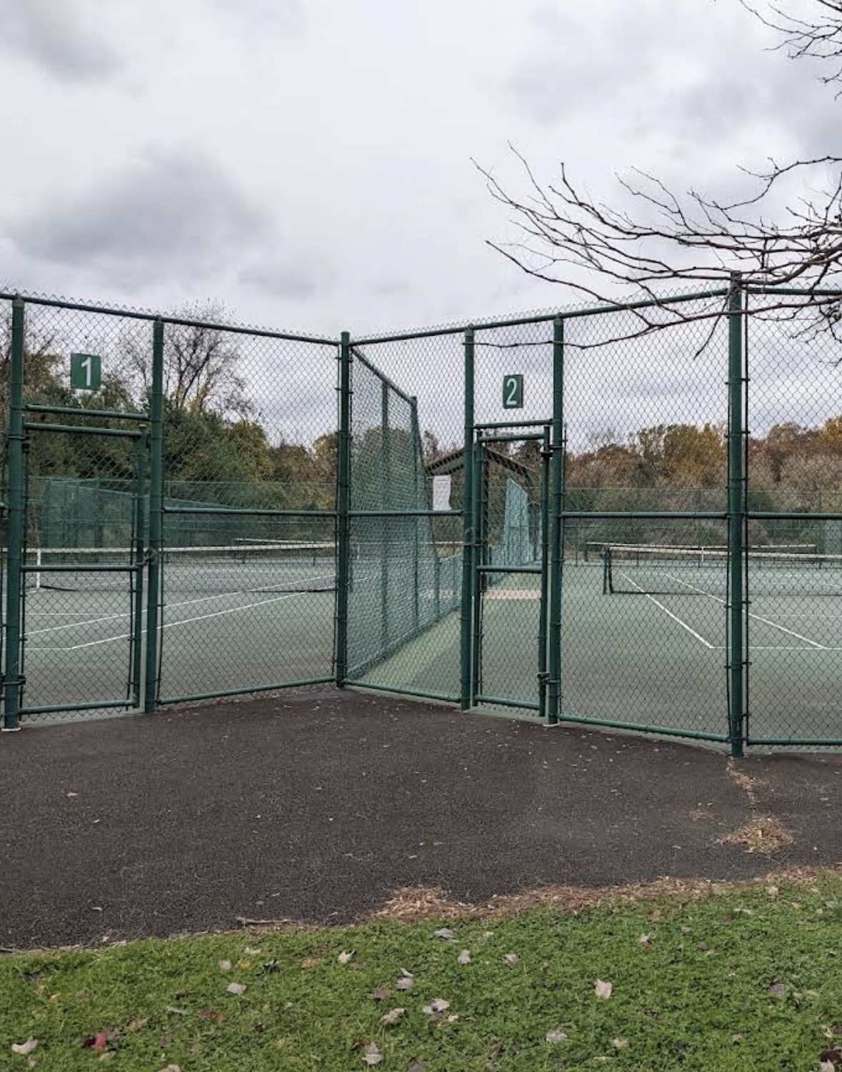 Gated entrance to the fenced tennis courts at Core Creek Park, Langhorne